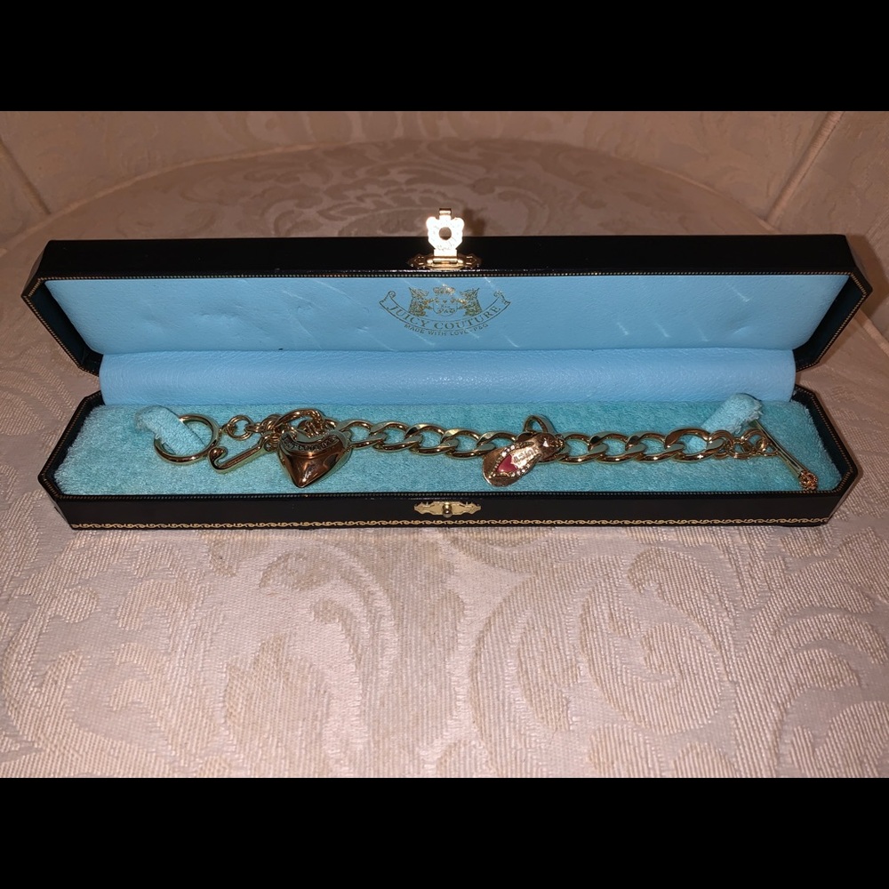 Juicy Couture charm bracelet in box. 3 charms!